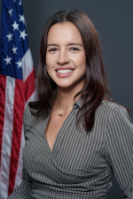 Image_Deputy City Clerk Odet Izquierdo - Woman with Brown Hair with Grey Background