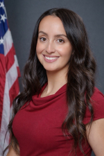 Image_Housing Assistance Program Manager - Woman in red shirt with Brown Hair